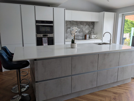 Kitchen Gloss White with Corian Worktop Project image