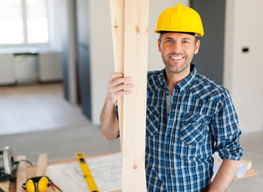 Portrait-of-happy-and-handsome-carpenter-483201955.jpg